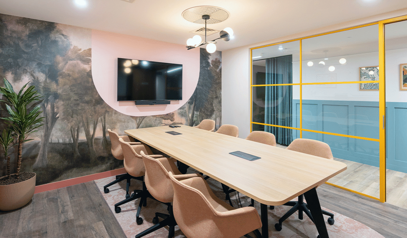 UK office conference room with large meeting table