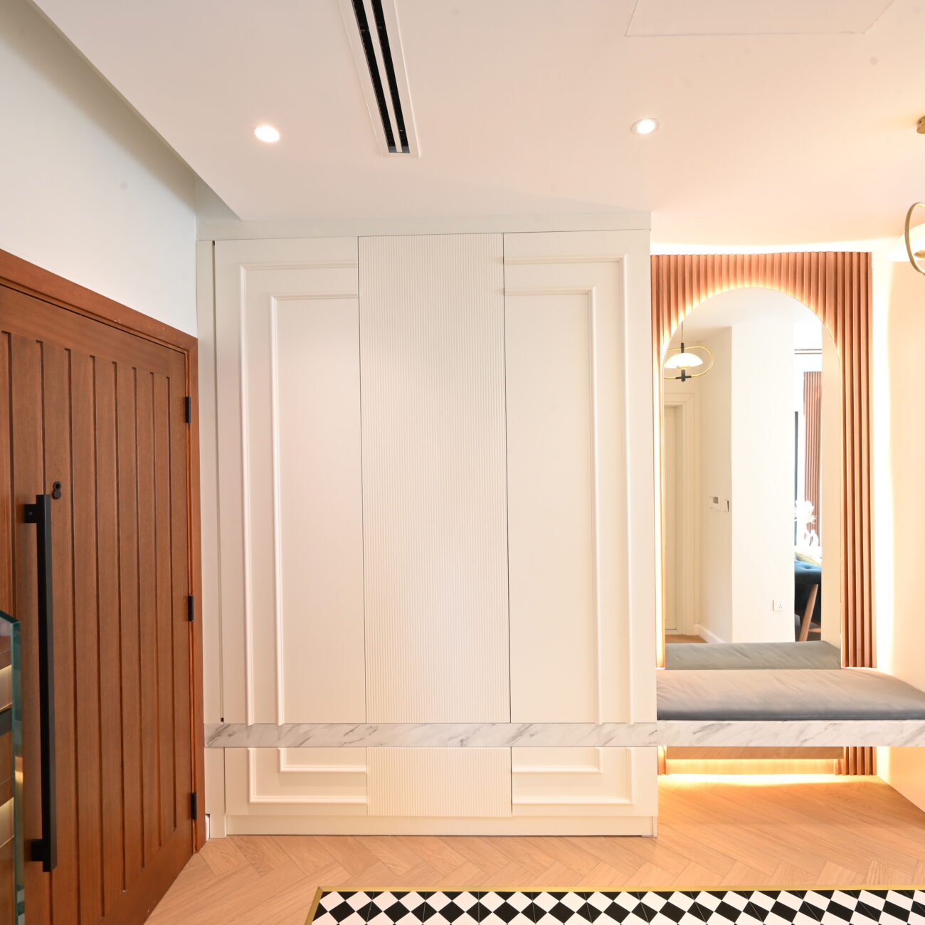 Modern villa entrance with landscaped pathway in Jumeirah Village Triangle, Dubai