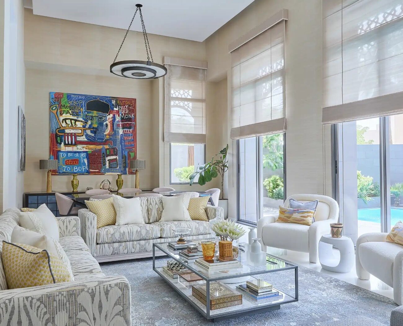 Open-plan living room with natural light in Nad Al Sheba villa