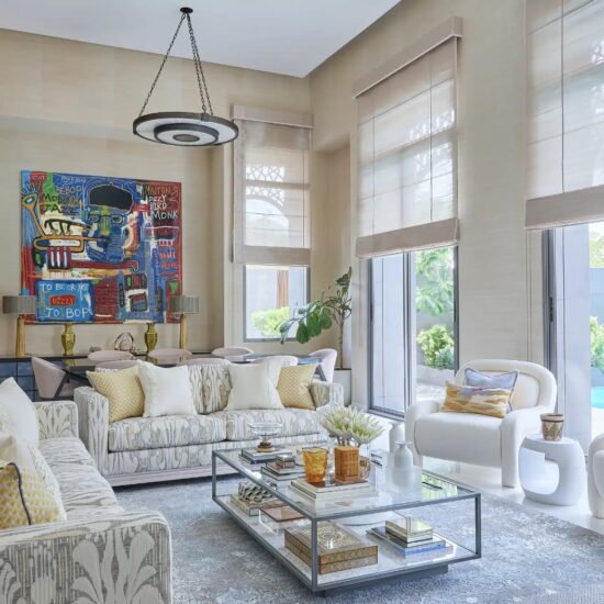 Open-plan living room with natural light in Nad Al Sheba villa