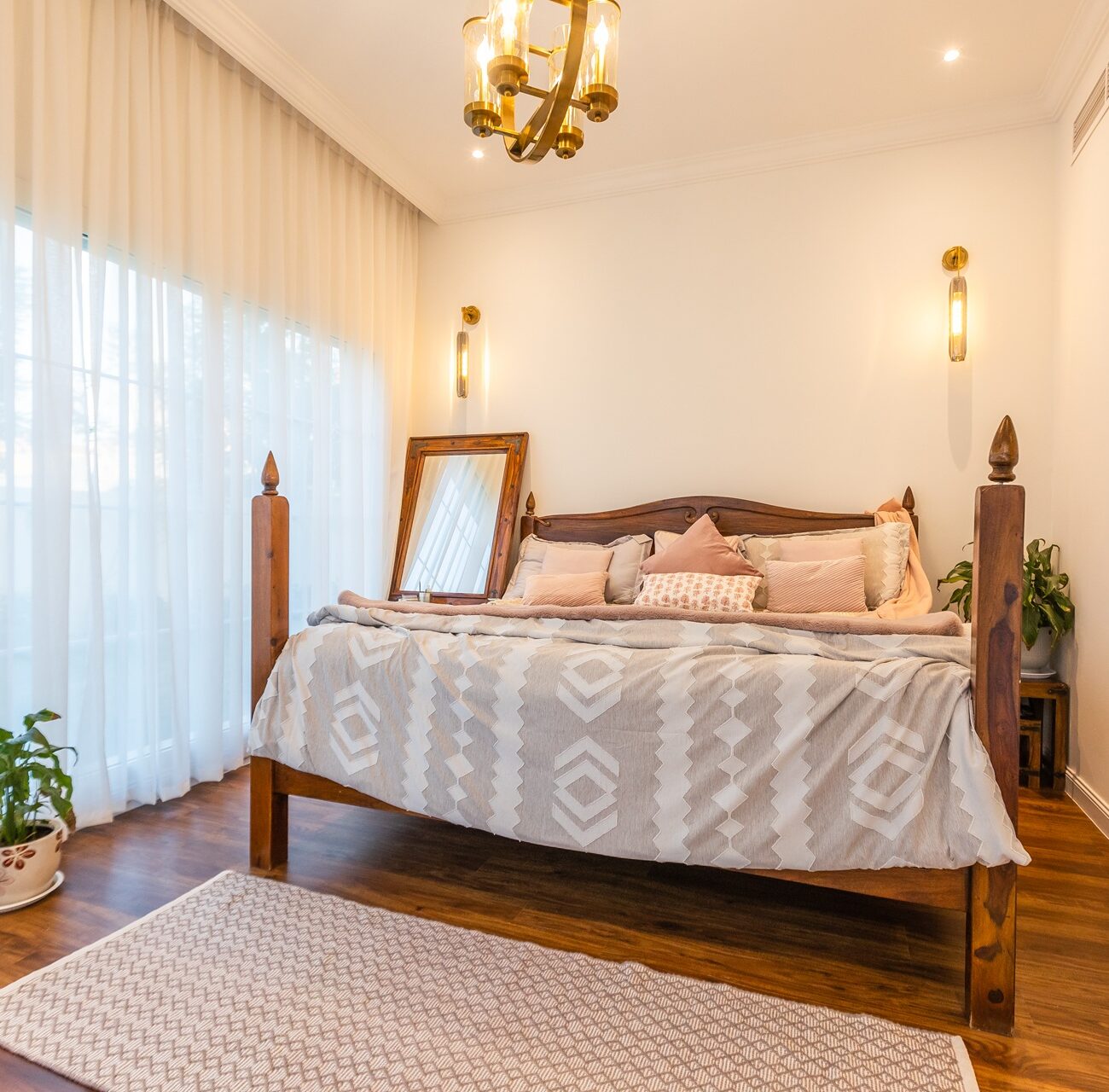 Bright villa bedroom in Jumeirah Village Triangle with natural lighting