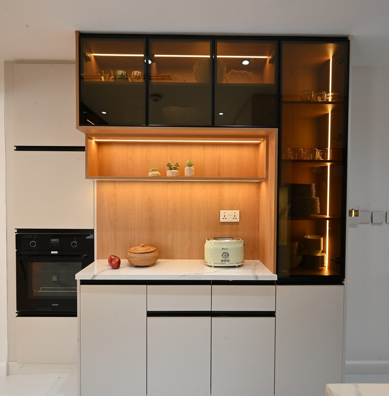 Luxury villa kitchen interior with built-in appliances in Jumeirah Village Triangle