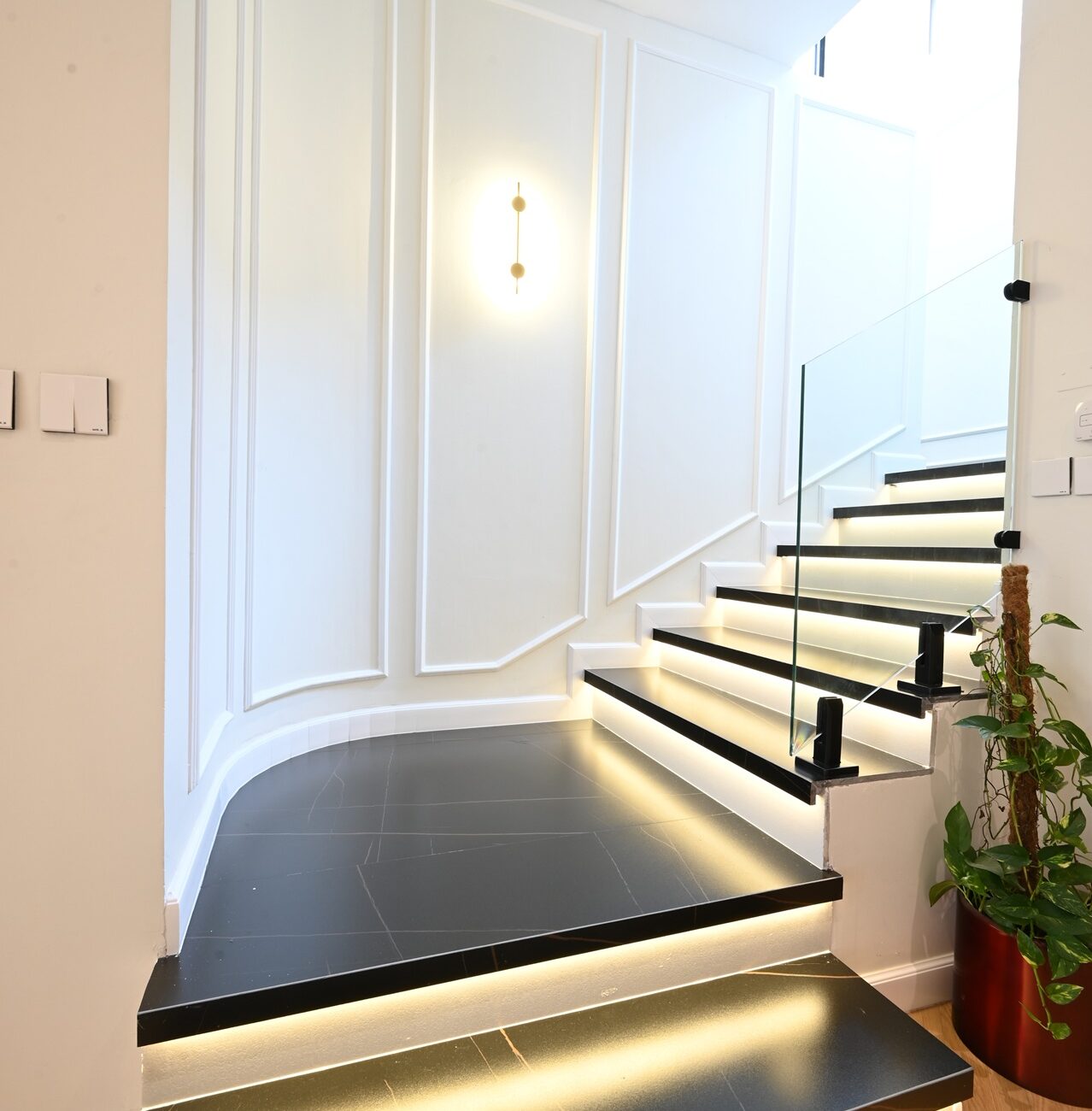Modern villa staircase with sleek railing at Jumeirah Village Triangle