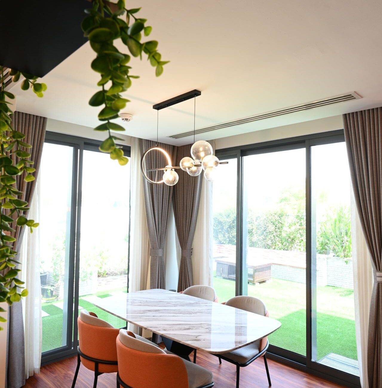 Modern Villa Nova Dubai living room interior with natural lighting